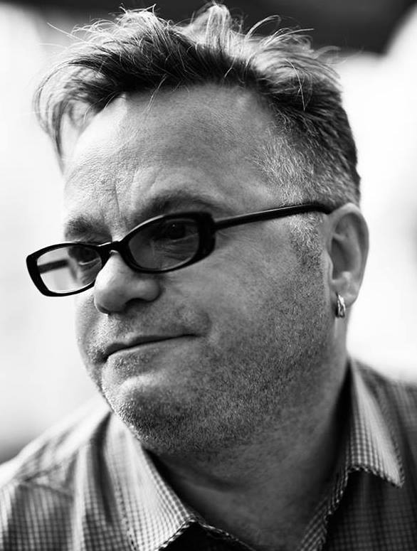 A headshot of The Format Factory co-founder Barry Ryan. He's wearing black glasses and has grey hair.